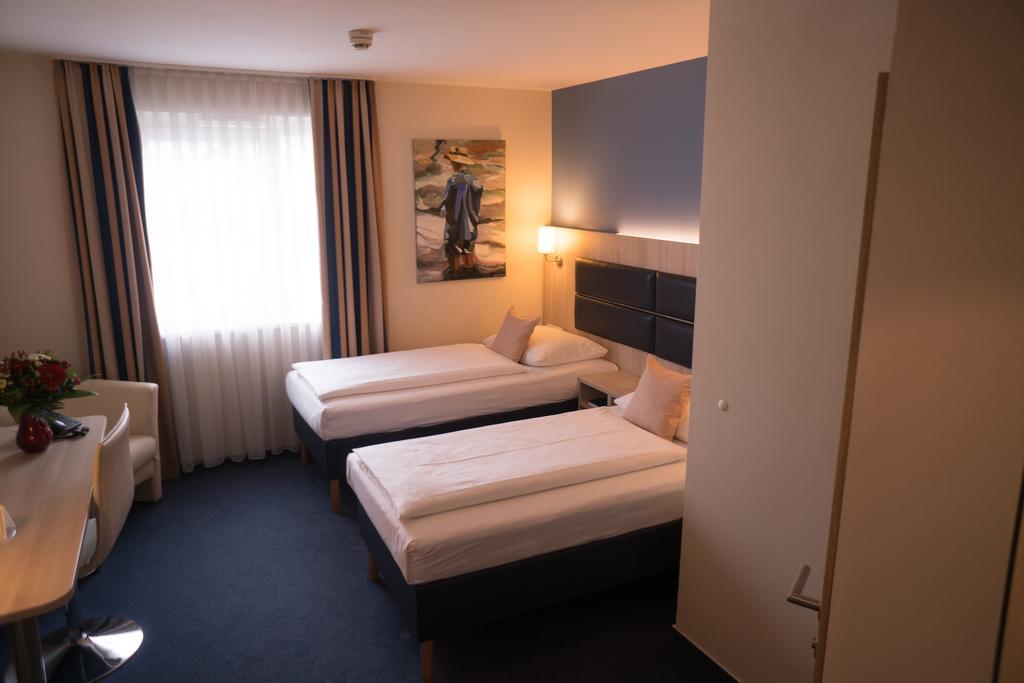 Hotel Roedelheimer Hof - Am Wasserturm Frankfurt am Main Quarto foto