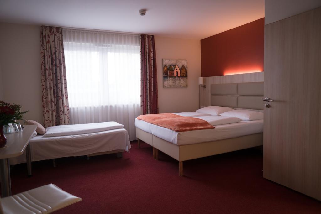 Hotel Roedelheimer Hof - Am Wasserturm Frankfurt am Main Quarto foto